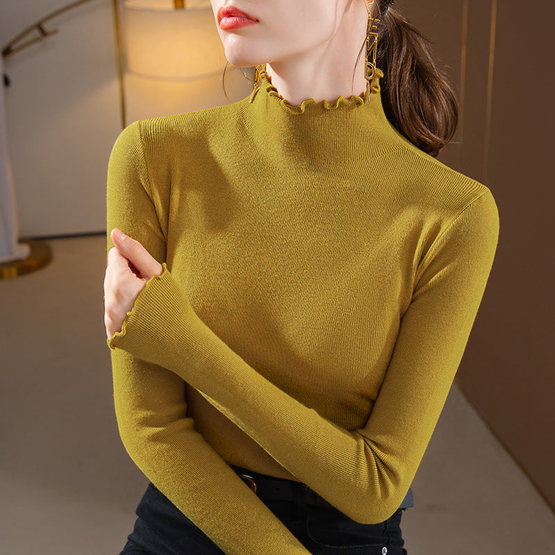 Dame Turtleneck top med elegante flæsedetaljer og fin struktur Stilla