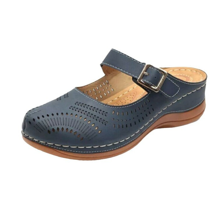 Dame Clogs med dekorativt gennembrudsdesign og justerbar rem Stilla