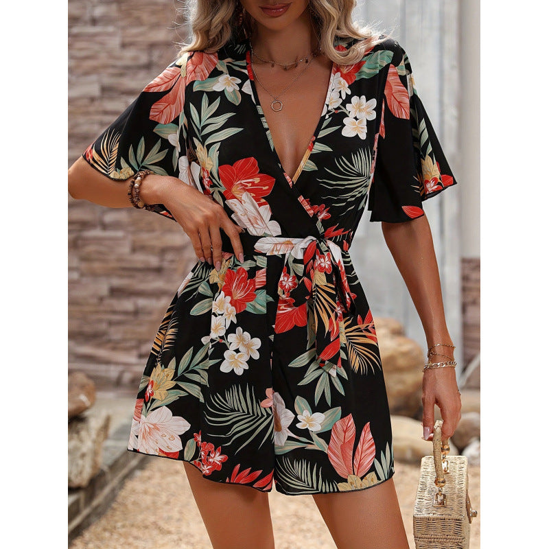 Dame jumpsuit med floralt design og vide ærmer Skovae