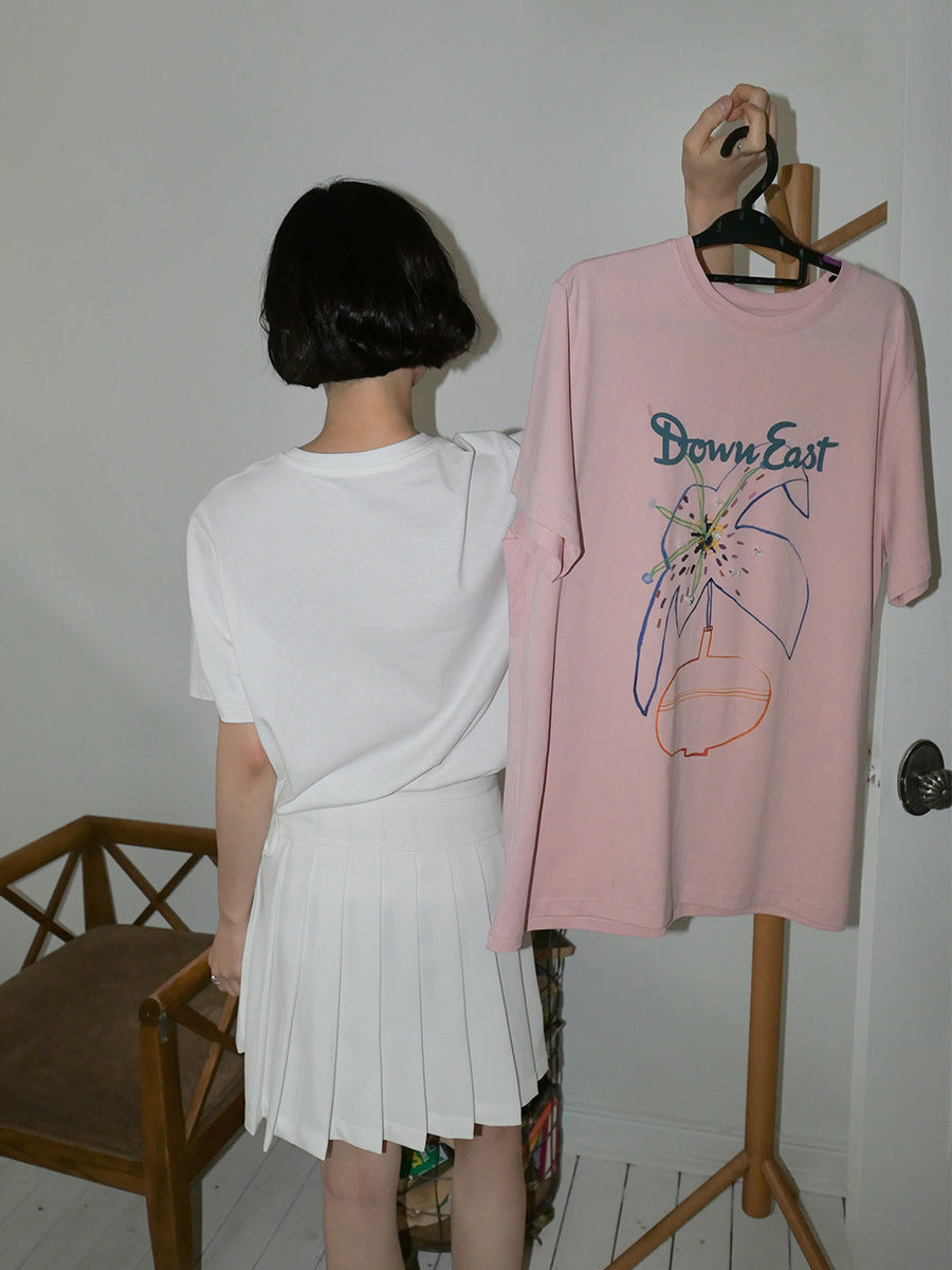 Dame T-shirt med floralt design og afslappet pasform Stilla