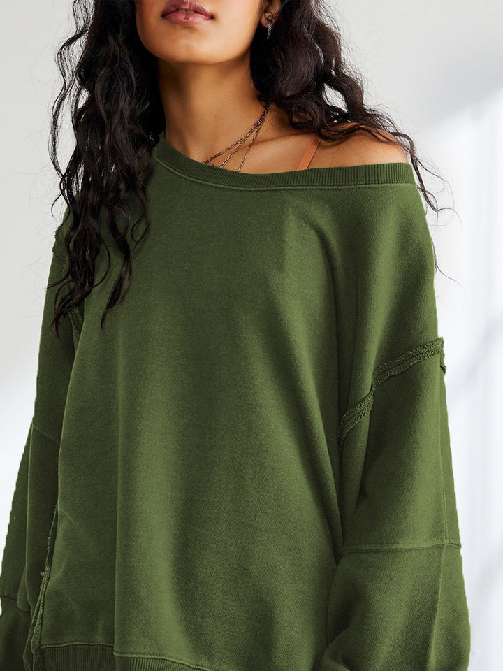 Dame afslappet oversized pullover med innovativt snit og fast stof Stilla