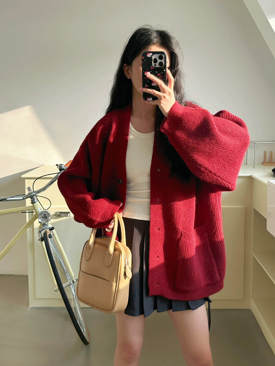 Kvinders hyggelige cardigan med store lommer og knapdetaljer Stilla