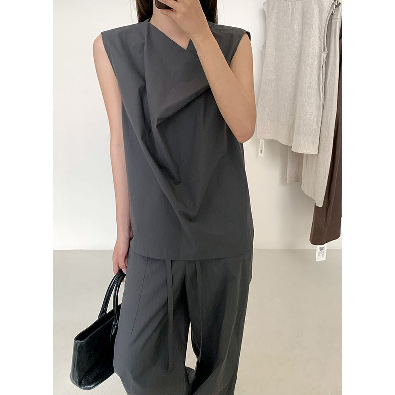 Dame ærmeløs bluse skjorte med innovativ draperingsdesign Stilla