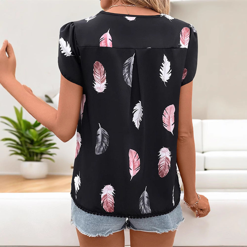 Damebluse med fint fjer-mønster og elegant V-udskæring Stilla