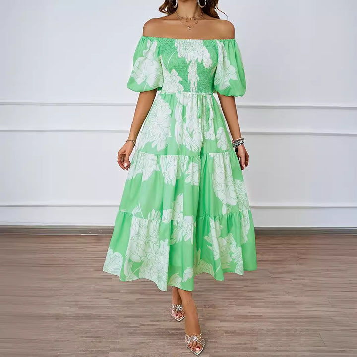 Dame maxikjole i afslappet off-shoulder design med voluminøse ærmer og blomsterprint Stilla