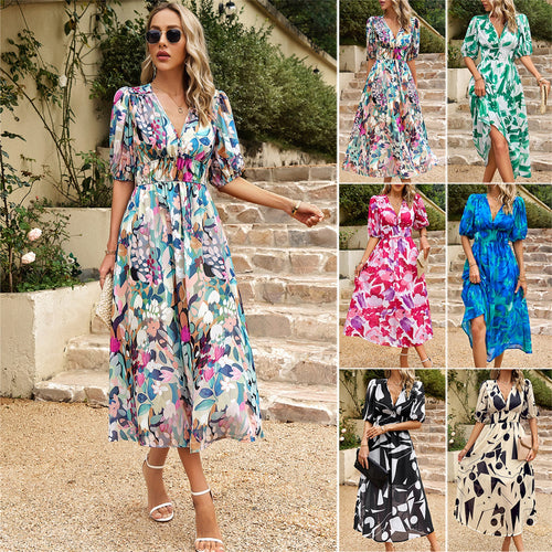 Dame Midikjole med moderne floral design og elastisk taljebånd Stilla