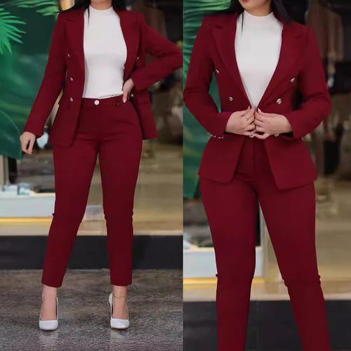 Dame moderne blazer-buksedragt med eksklusive knapdetaljer Stilla