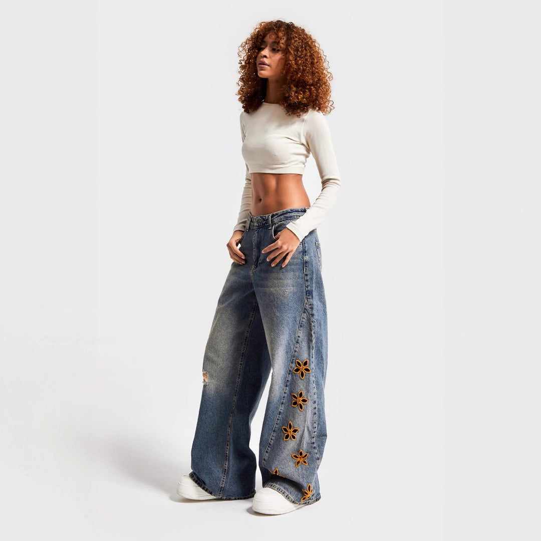 Dame brede jeans med blomstret broderi Skovae