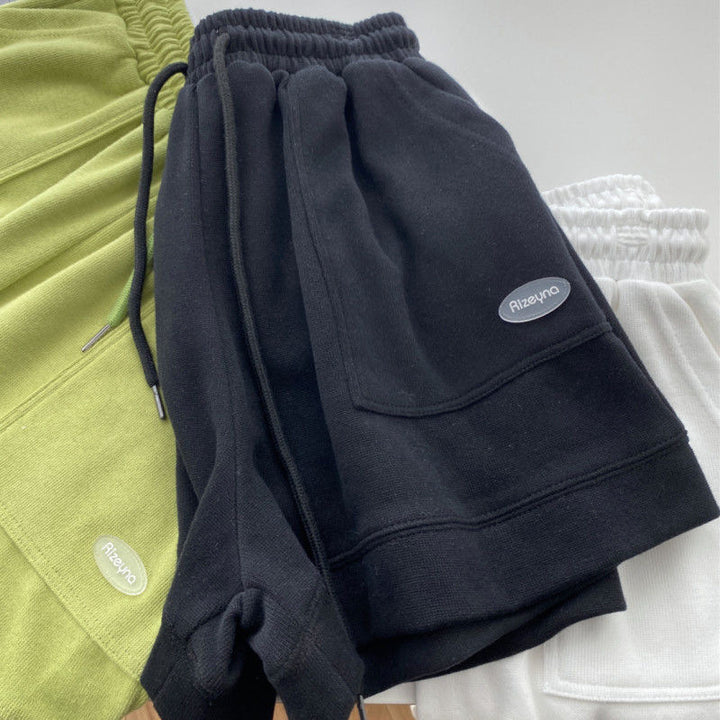 Kvindernes afslappede joggingshorts med elastisk talje og praktiske sidelommer