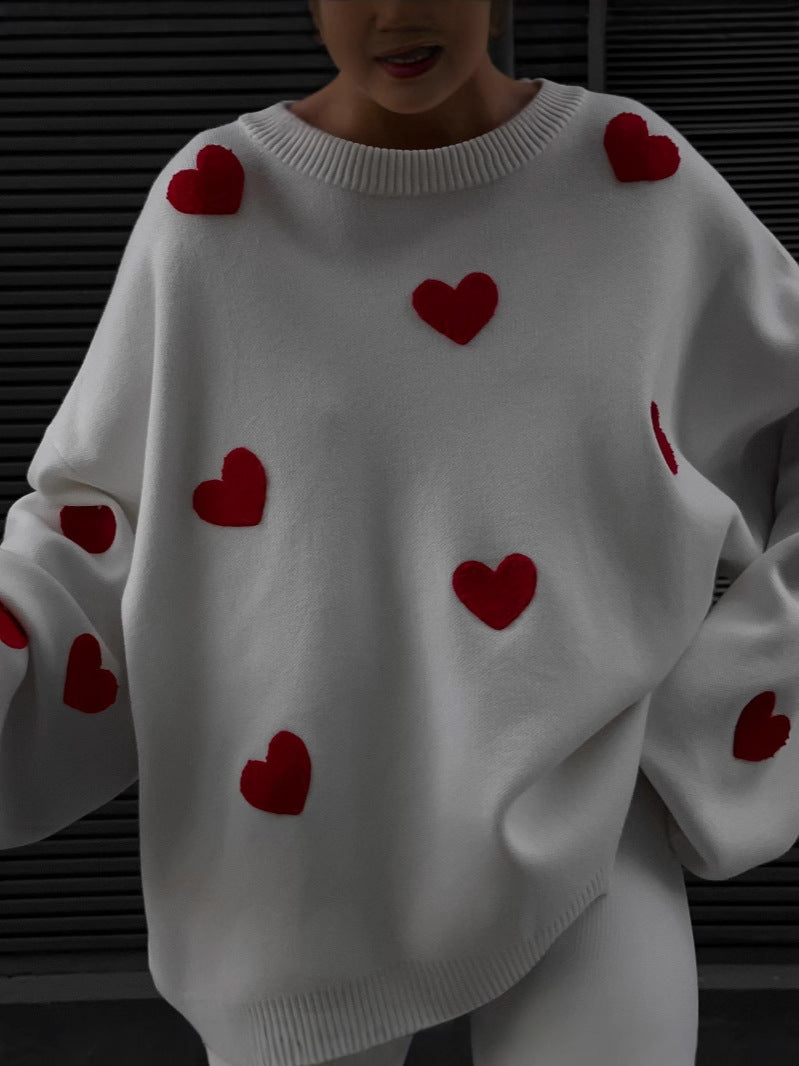 Dame hyggelig sweater med hjerteformede applikationer og bred pasform Stilla