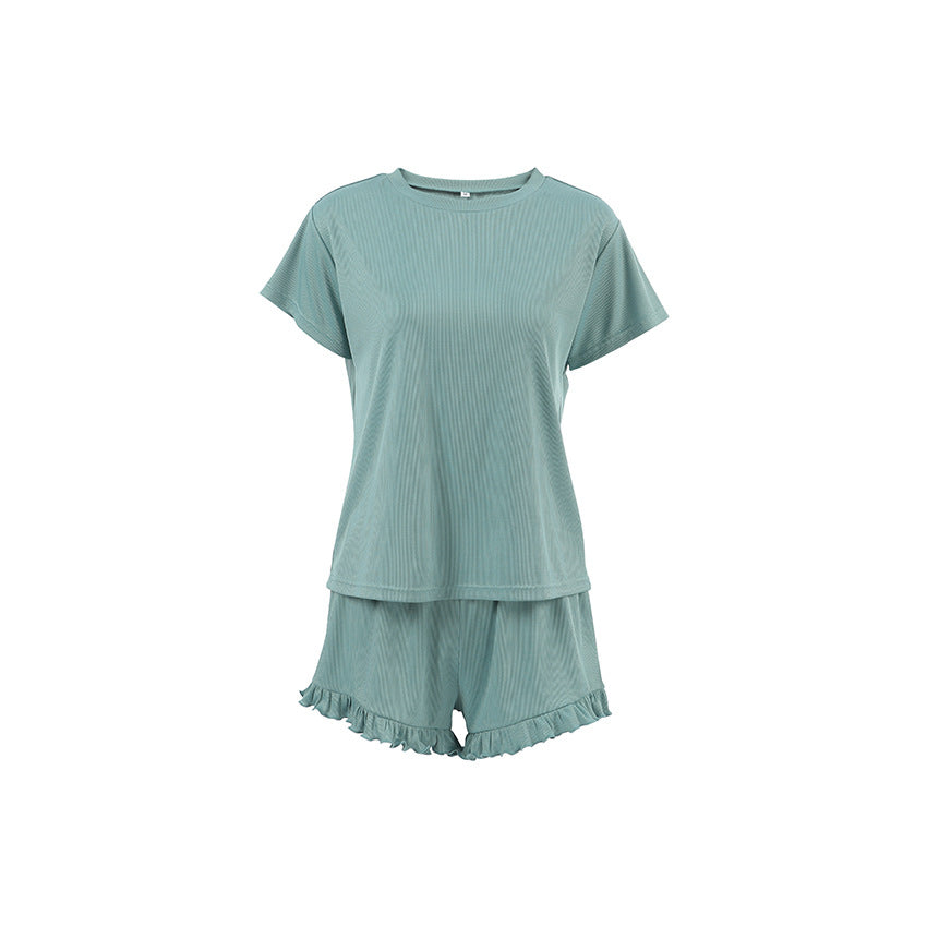 Dame sæt fra afslappet cropped-top og komfortable shorts med flæsedetaljer Stilla