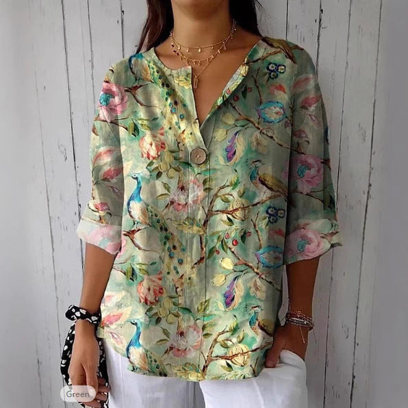 Damebluse med blomsterdesign og knaplukning Stilla