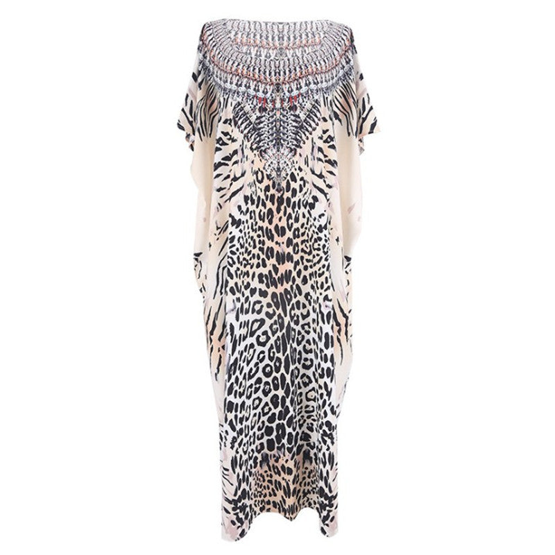 Dame strandkaftan med kunstnerisk dyreprint og elegante accenter Stilla