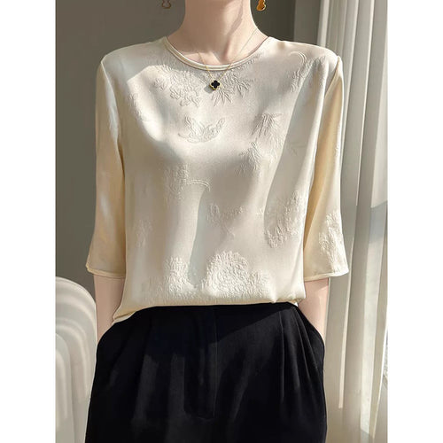 Damebluse med elegant broderi og fin struktur Stilla