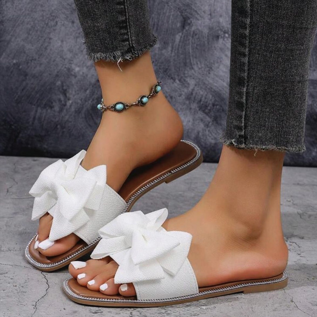Dame Mules med oversized sløjfe-design og strass dekoreret sål Stilla