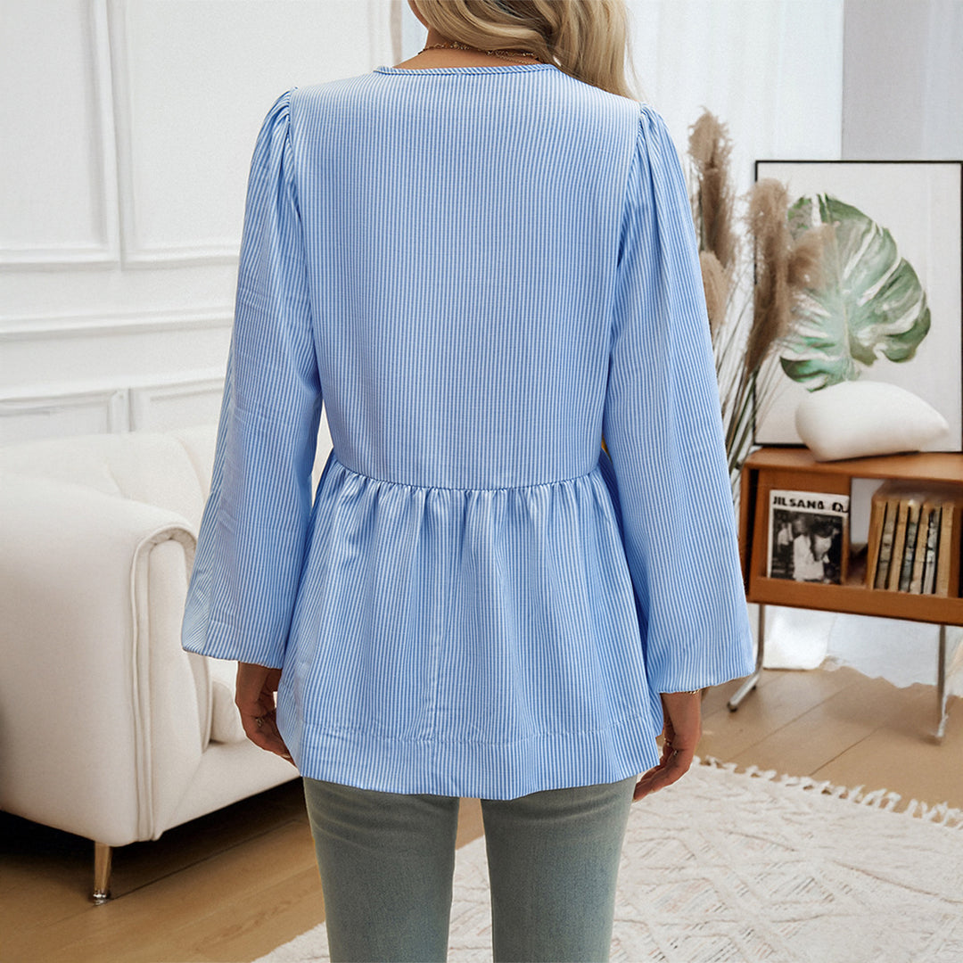 Damebluse med bånd og puffærmer Stilla