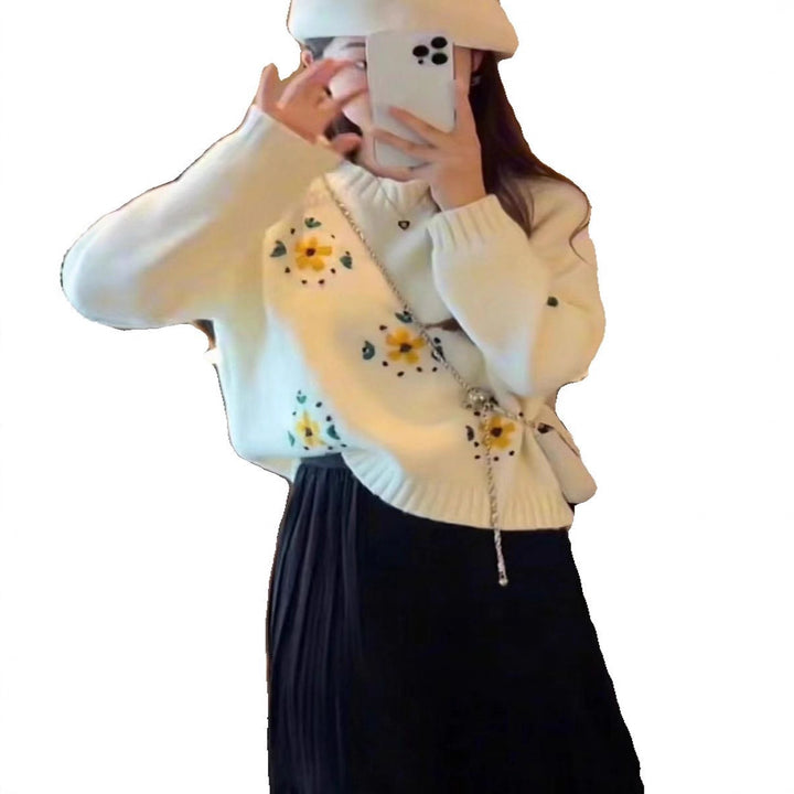 Women's knitted sweater with floral design Stilla