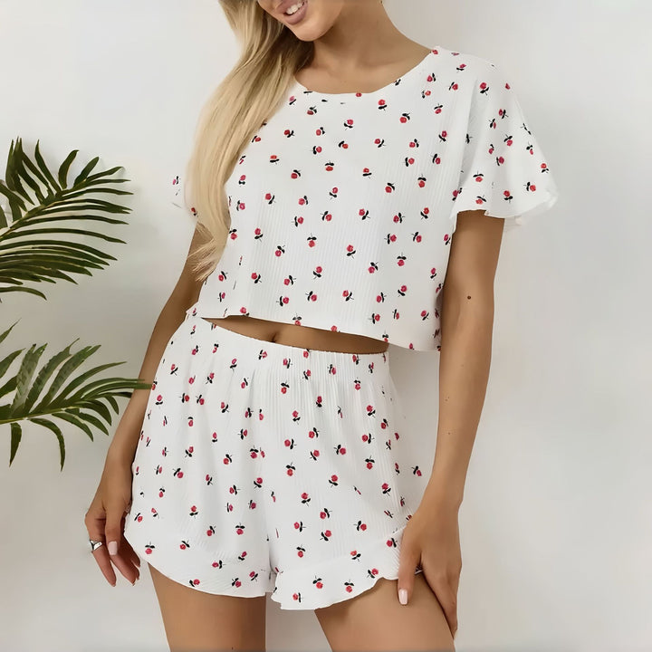 Dame let pyjamasæt med legende blomsterdesign og flæser Stilla