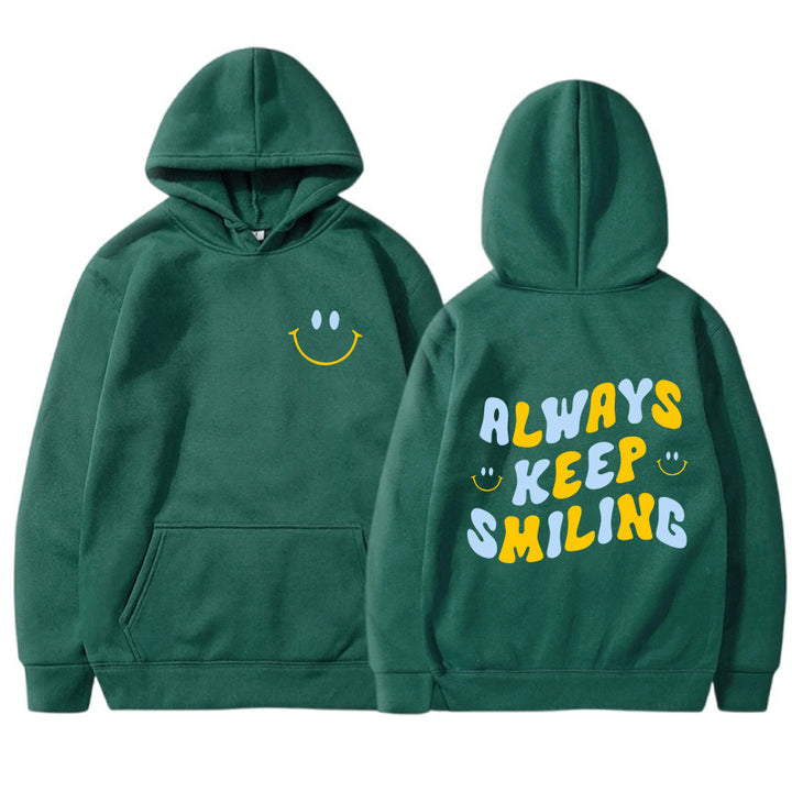 Dame hoodie med munter skrift og praktiske kangaroo lommer Skovae
