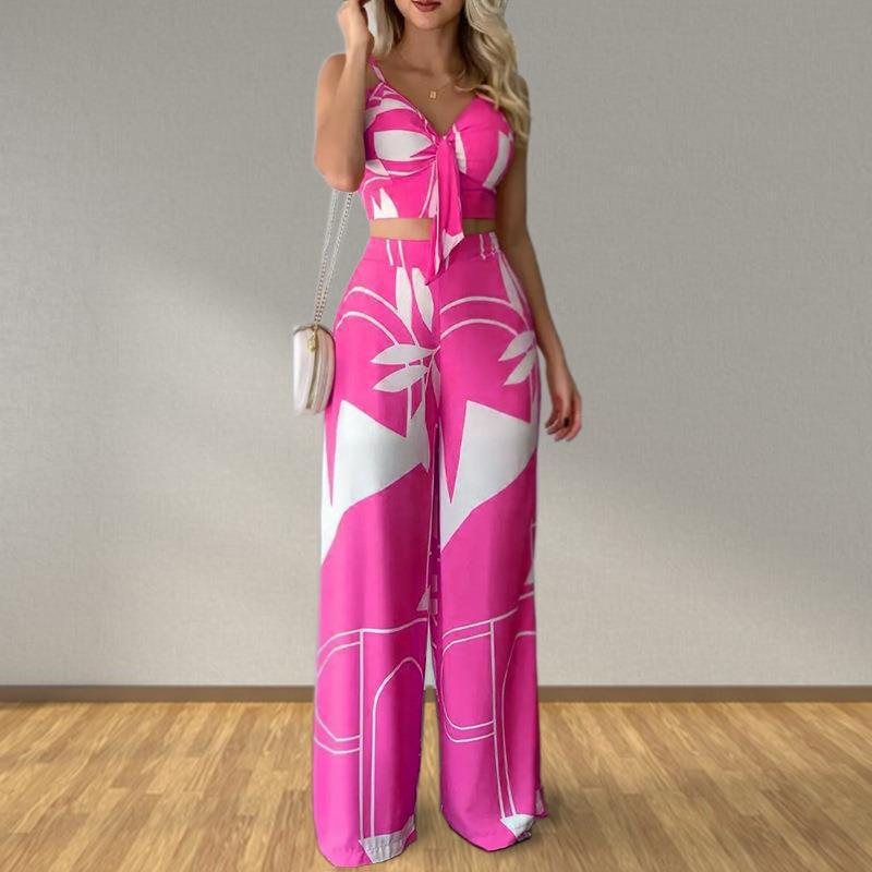Kvinders elegante sæt med kombination af cropped top og brede bukser Stilla