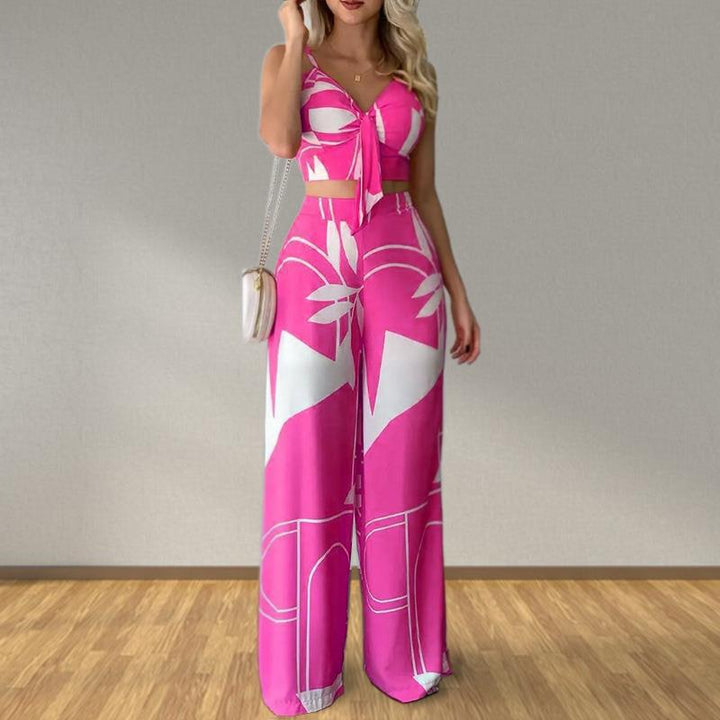 Kvinders elegante sæt med kombination af cropped top og brede bukser Stilla