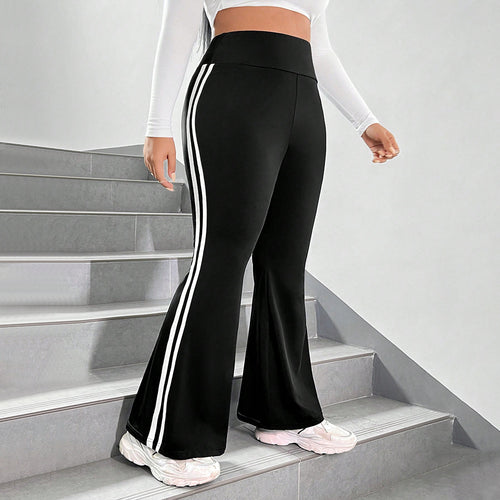 Damer Sporty Flared Leggings med elastisk talje og sidelange striber Stilla