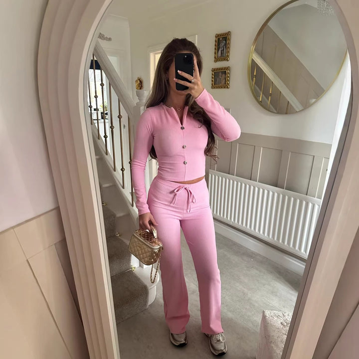 Dame jumpsuit med elegant knaplukning og afslappet snit