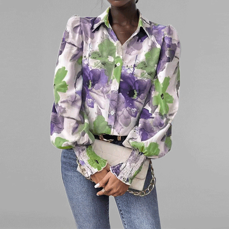 Damebluse med blomstertrykt og puffærmer Stilla