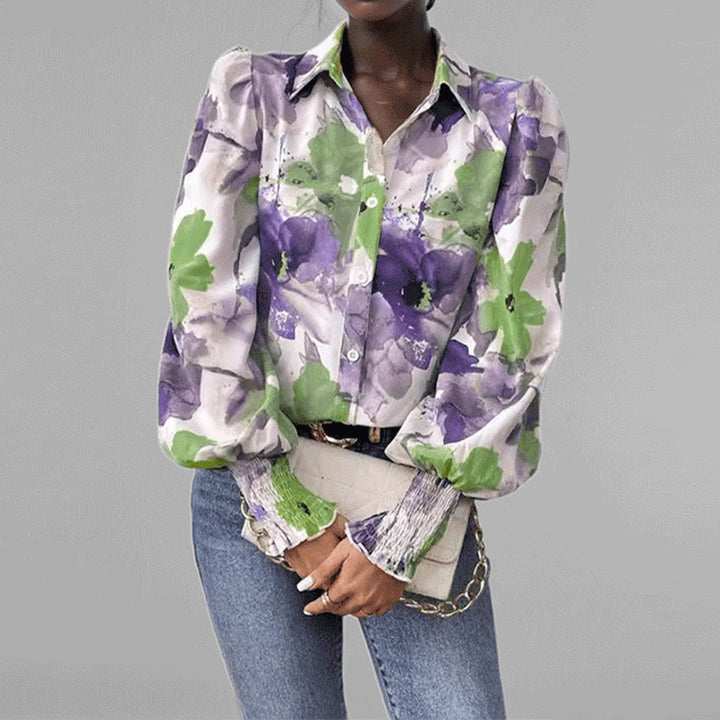Damebluse med blomstertrykt og puffærmer Stilla