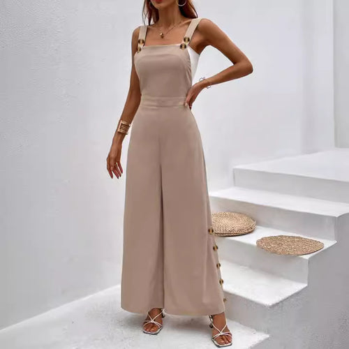 Dame jumpsuit i elegant snit med dekorative knapdetaljer Stilla