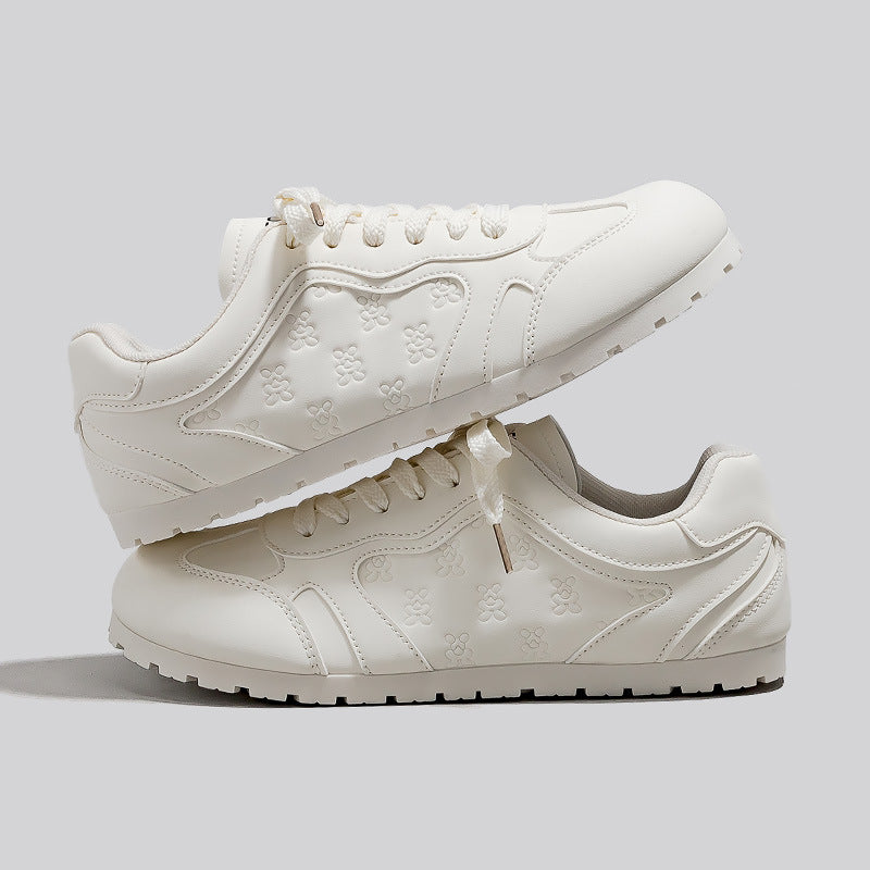 Dame Sneakers i sporty-elegant design med blomster mønster og skridsikker sål Stilla