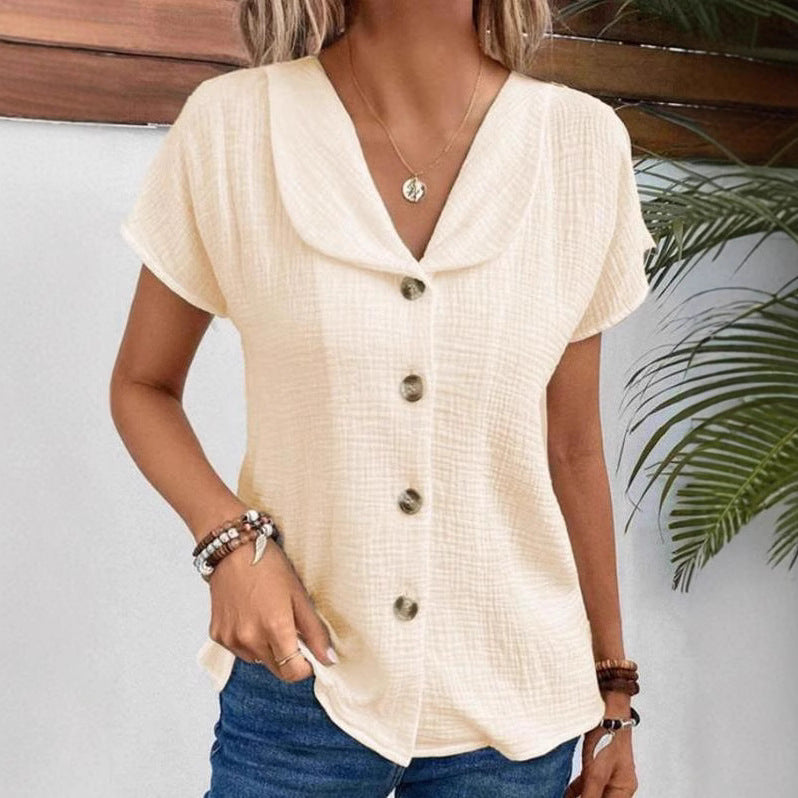 Damebluse med synlige knapper lavet af let stof Stilla