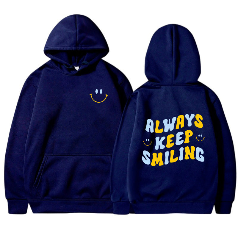 Dame hoodie med munter skrift og praktiske kangaroo lommer Skovae