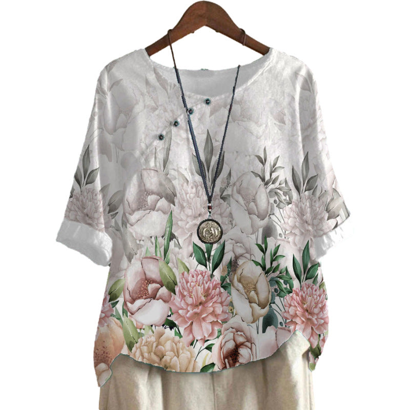 Damer bomuldsbluse med blomstertryk og elegant knaplukning Stilla