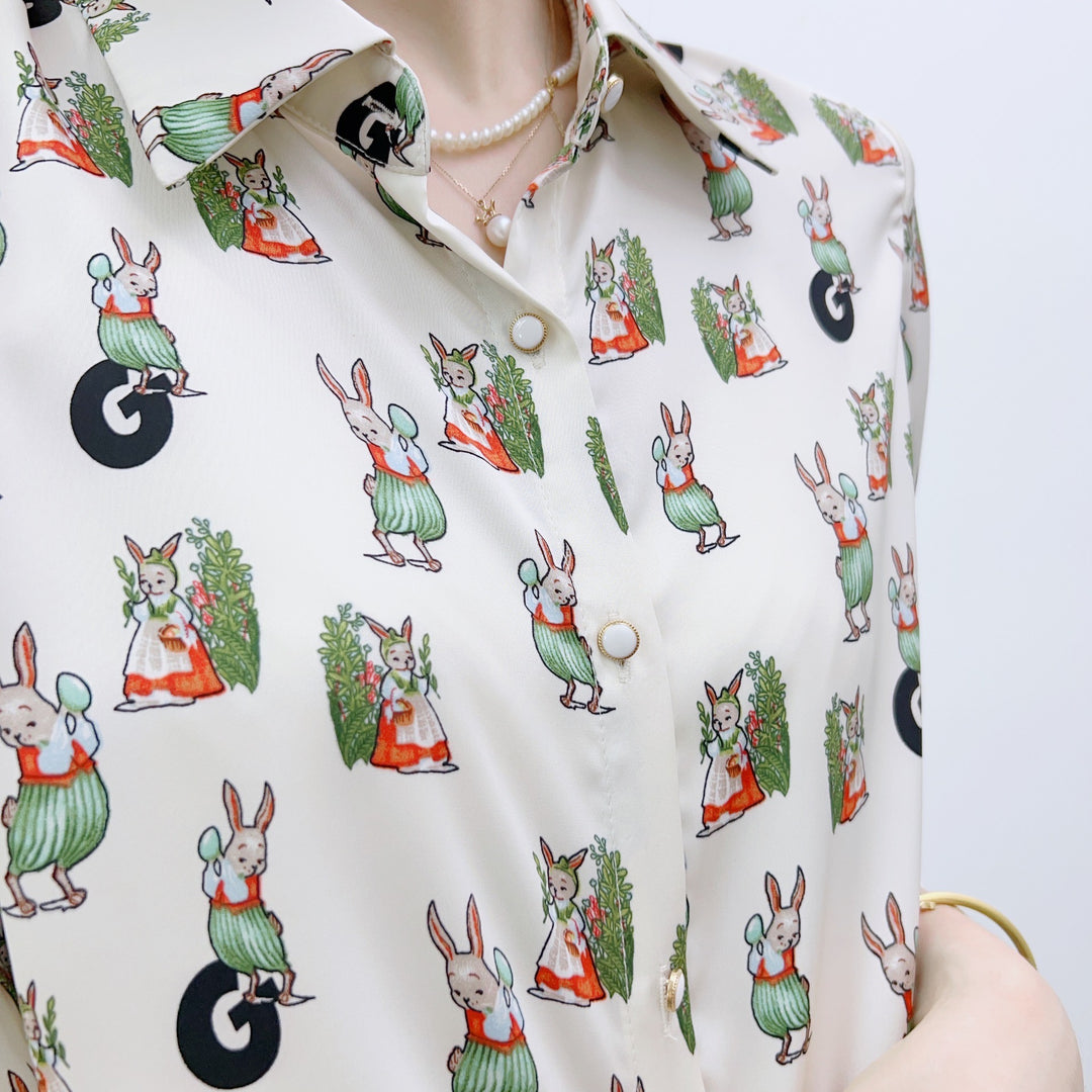 Damebluse med legende dyremotiv og elegante detaljer Stilla