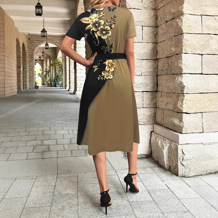 Damer Elegant fritidskjole med blomstret design og flot bælte Stilla