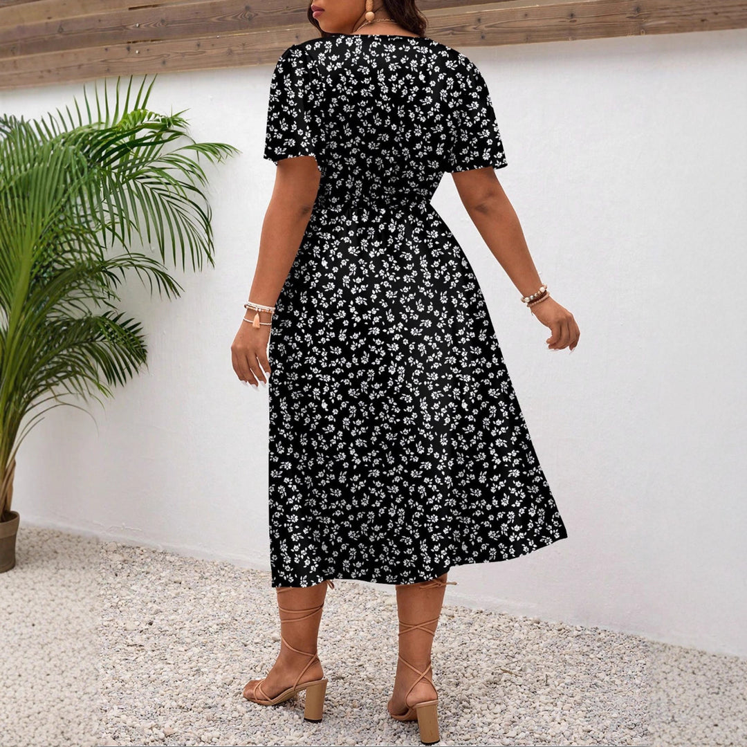 Dame Midi-kjole med blomsterprint og flattering slids Skovae