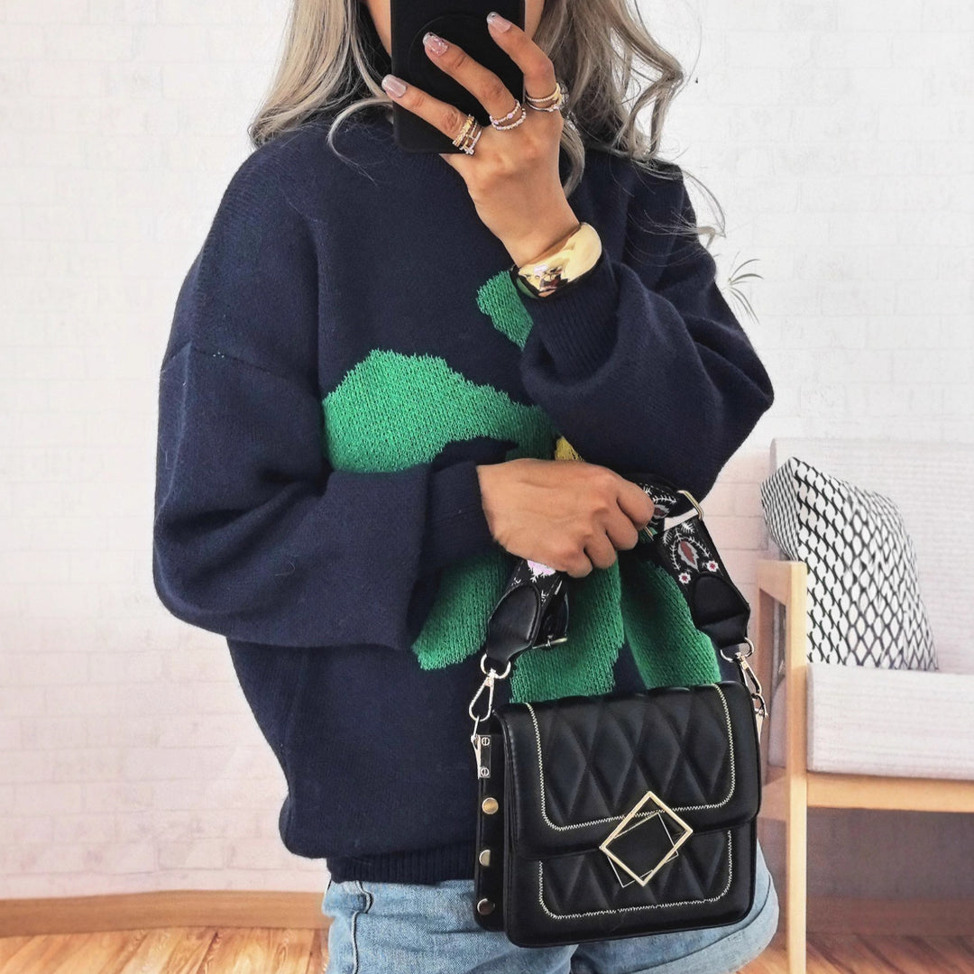 Kvinders afslappede strikket sweater med farverigt blomster mønster og sænkede skuldre Stilla
