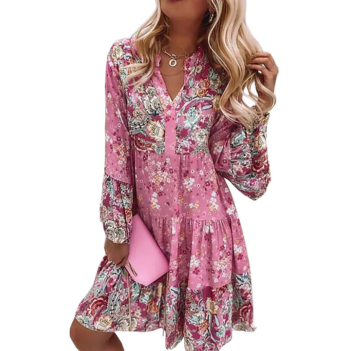 Dame fritidskjole i floral look med moderne V-udskæring og voluminøse ærmer Stilla