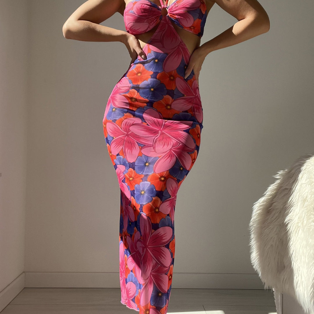 Dame Maxikjole med unikt cut-out-design og blomsterprint Stilla