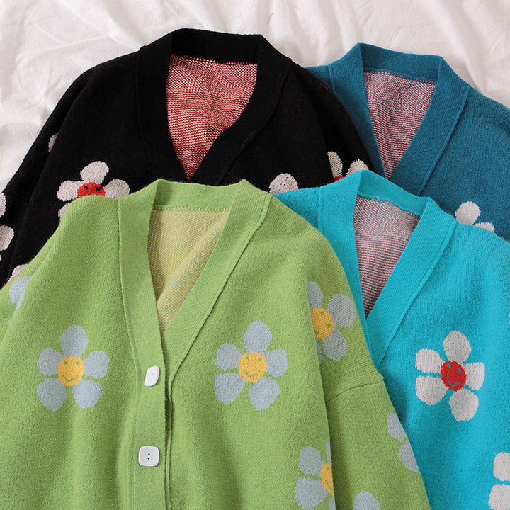 Kvinders chunky strik cardigan med blomstermønster og knapdetaljer Stilla
