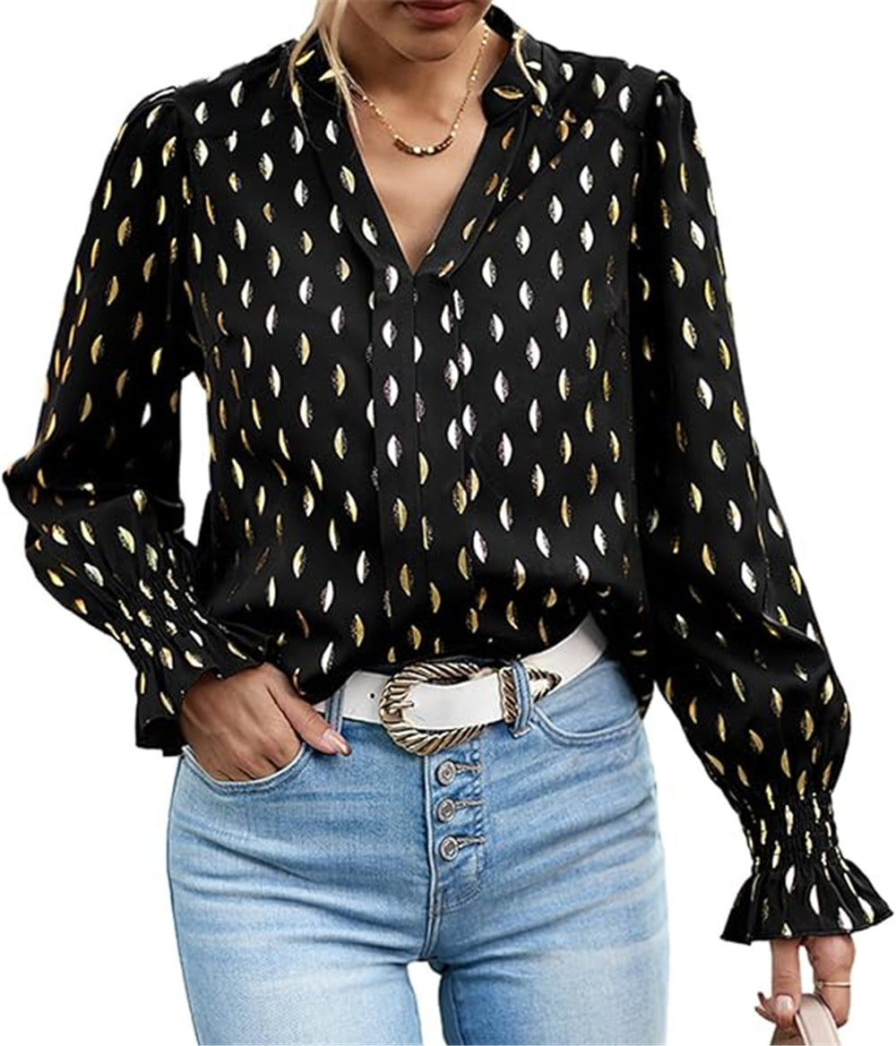 Damebluse med elegant guldmønster Stilla