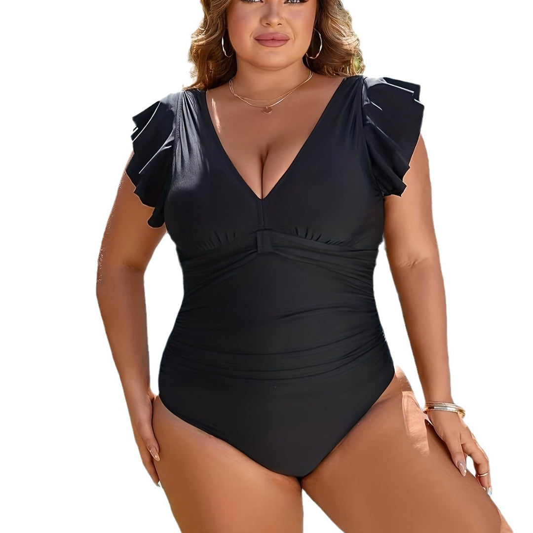 Dame one-piece swimsuit with fashionable ruffle details Skovae