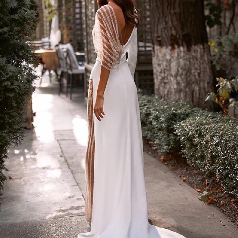 Dame Elegant Jumpsuit med asymmetrisk snit og glitrende accenter Stilla