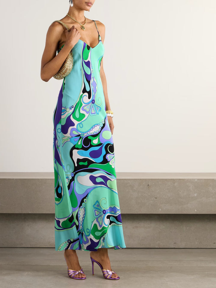 Dame nan elegant Slip-maxikjole med V-udskæring, filigran spaghetti-stropper og retro-grafisk allover-print Skovae