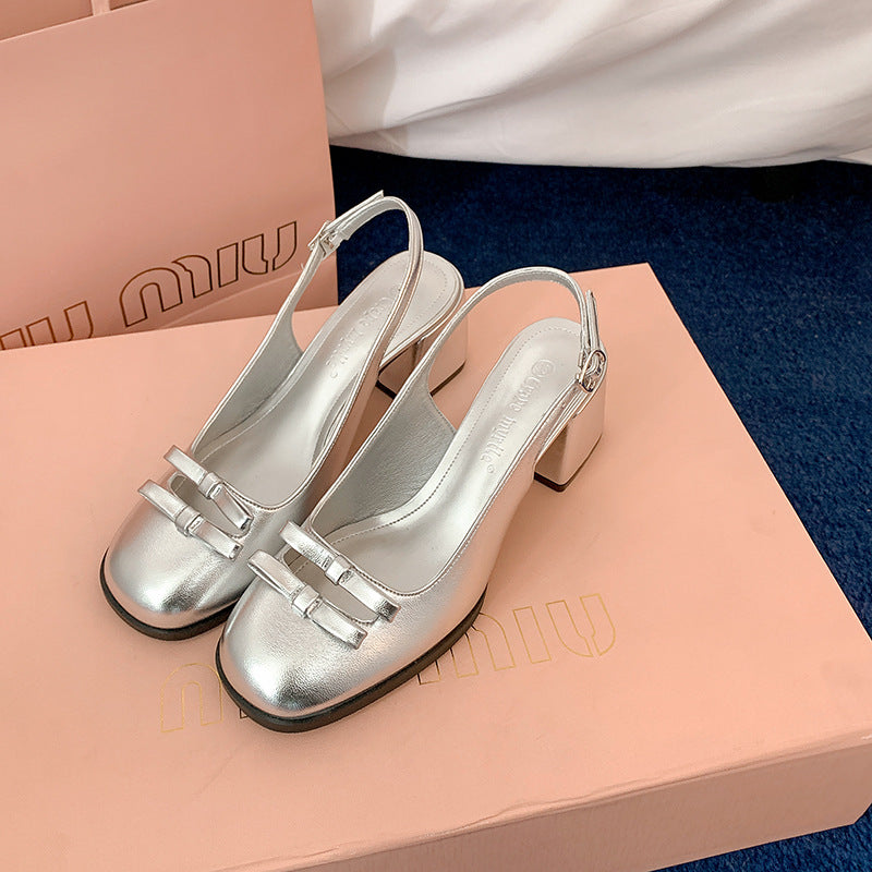 Dame Sling-pumps med elegant sløjfedekoration og komfortabel blokhæle Stilla