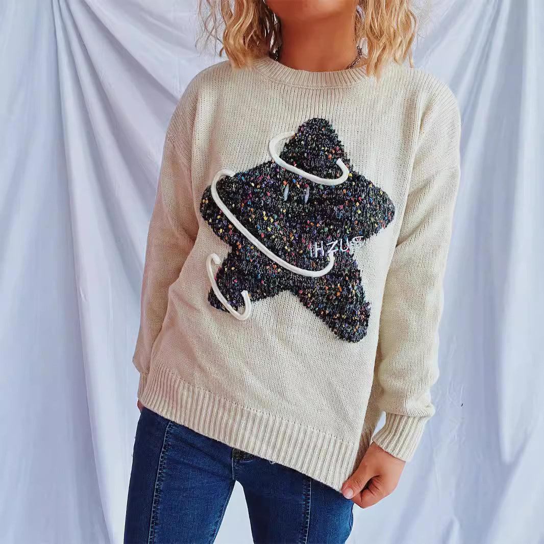 Kvindernes strikkede sweater med glitrende stjerne motiv og løs pasform Stilla