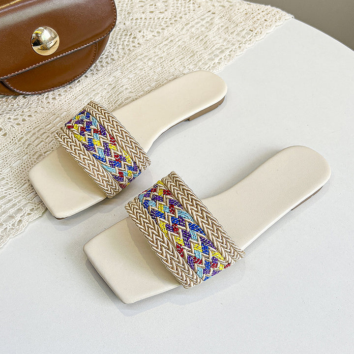 Dam flade sandaler med stilfuld flettet design og behagelig sål Stilla