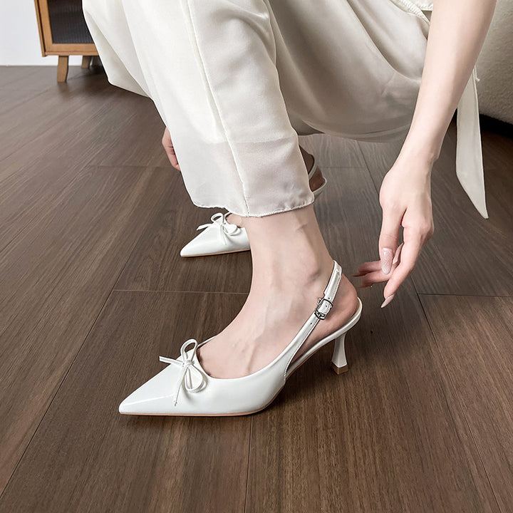 Dame Sling-Pumps med klassisk design og moderigtigt sløjfedetalje Stilla