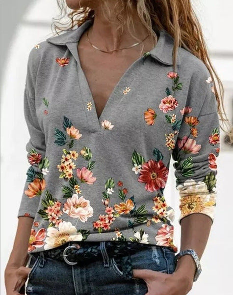 Damebluse med blomsterdesign og polo-krave Stilla